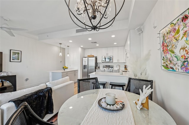 dining area with ceiling fan