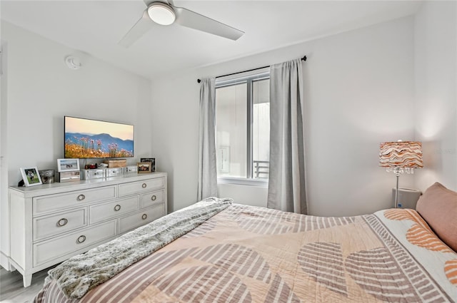 bedroom featuring ceiling fan and light hardwood / wood-style floors