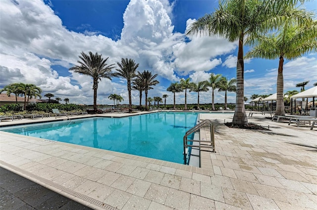 pool with a patio