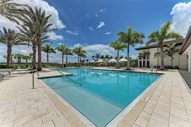 community pool with a patio