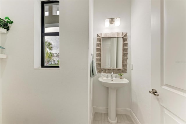 bathroom featuring baseboards