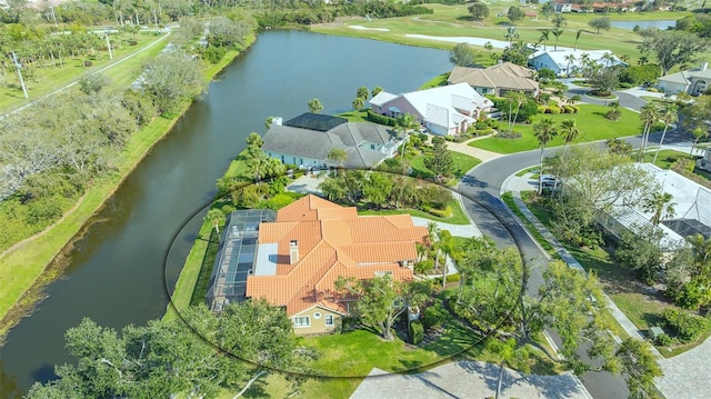 aerial view featuring a water view and a residential view