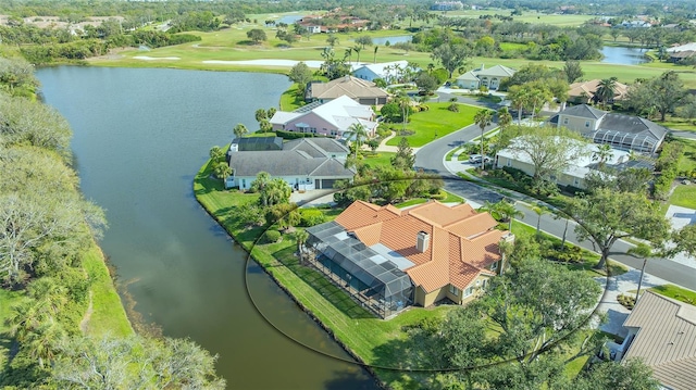 birds eye view of property featuring a water view and a residential view