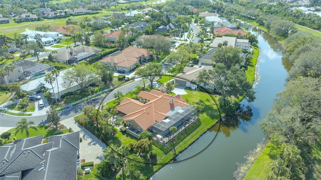 aerial view featuring a water view and a residential view