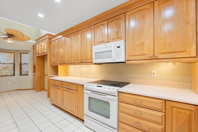 kitchen featuring light tile patterned floors, white appliances, and ceiling fan