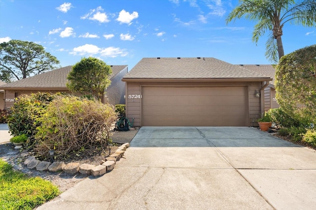 single story home with a garage