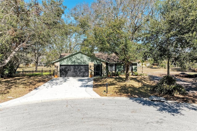 view of front of property with a garage