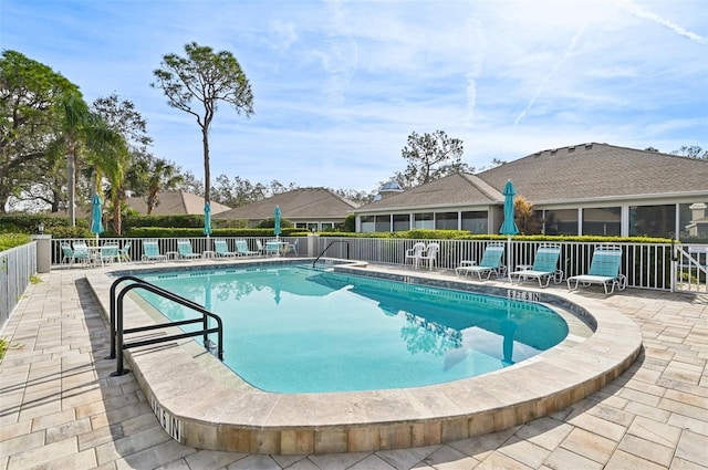 view of pool featuring a patio