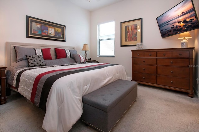 bedroom with light carpet