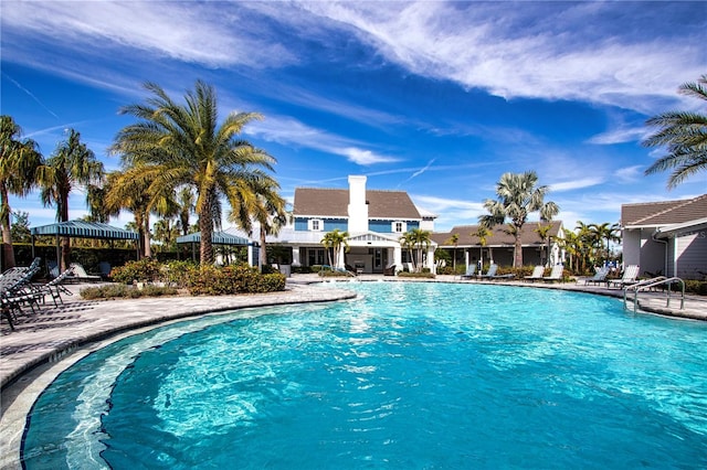 view of swimming pool with a gazebo and a patio area