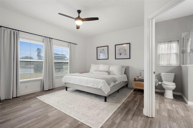 bedroom featuring ceiling fan and light wood-type flooring