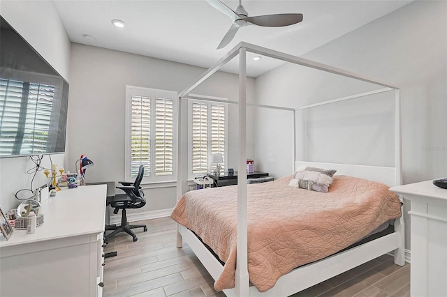 bedroom featuring wood finish floors, recessed lighting, a ceiling fan, and baseboards