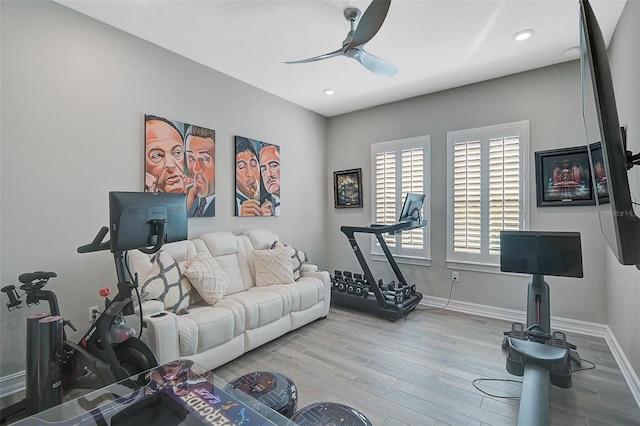 exercise area featuring ceiling fan, recessed lighting, wood finished floors, and baseboards