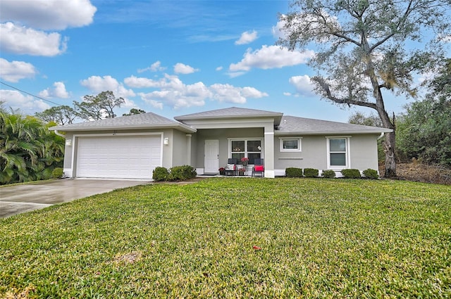 view of front facade featuring a garage and a front yard