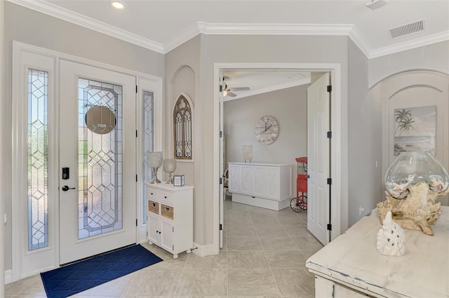 tiled entryway with crown molding