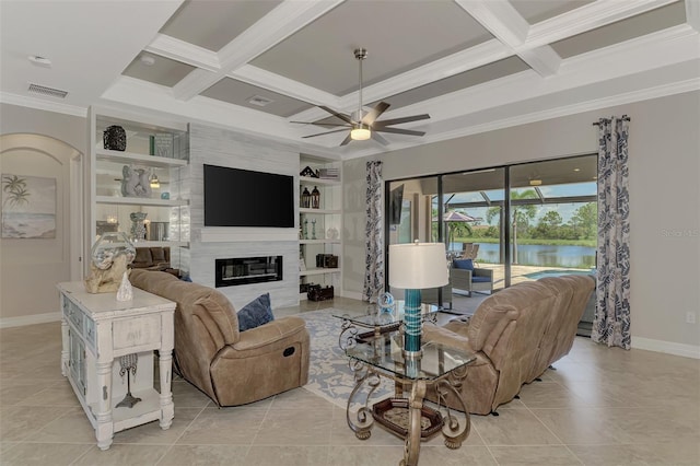 tiled living room with crown molding, a large fireplace, coffered ceiling, and ceiling fan