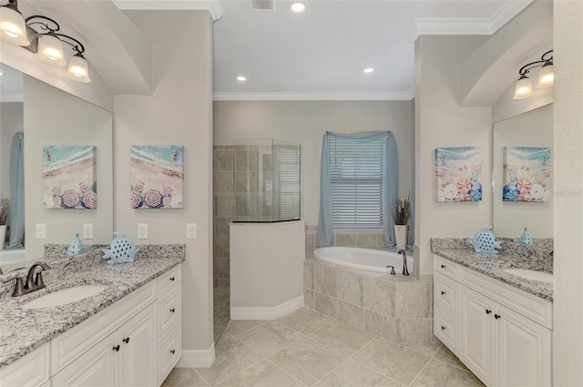 bathroom with tile patterned flooring, crown molding, separate shower and tub, and vanity