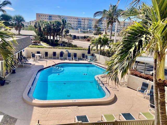 view of pool featuring a patio