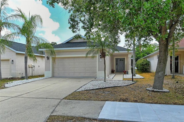 ranch-style home with a garage