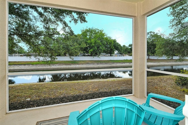 view of pool with a water view