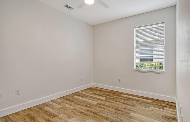 unfurnished room with ceiling fan and light hardwood / wood-style floors