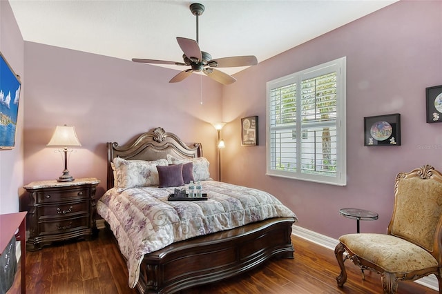 bedroom featuring dark wood-type flooring and ceiling fan