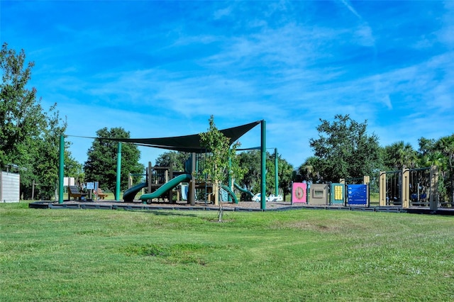 view of play area featuring a lawn