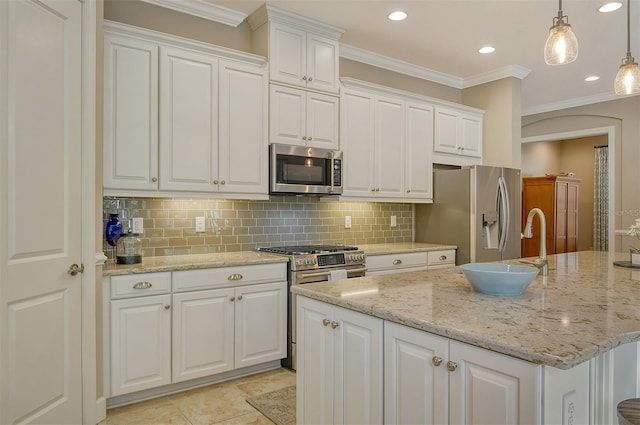 kitchen with light stone counters, appliances with stainless steel finishes, pendant lighting, decorative backsplash, and white cabinets