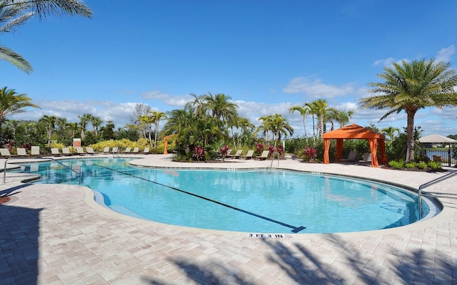 view of pool featuring a gazebo and a patio area