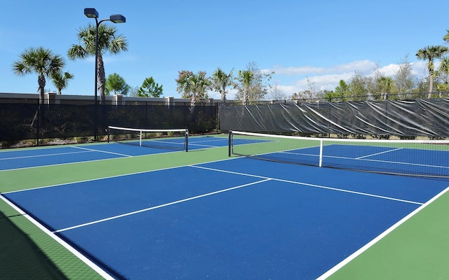 view of tennis court with basketball court