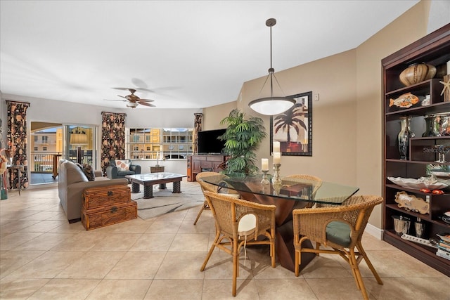 dining space with plenty of natural light, light tile patterned floors, and ceiling fan