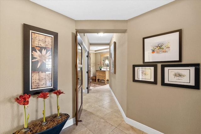 hall with light tile patterned flooring