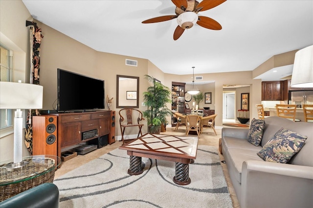 living room featuring ceiling fan