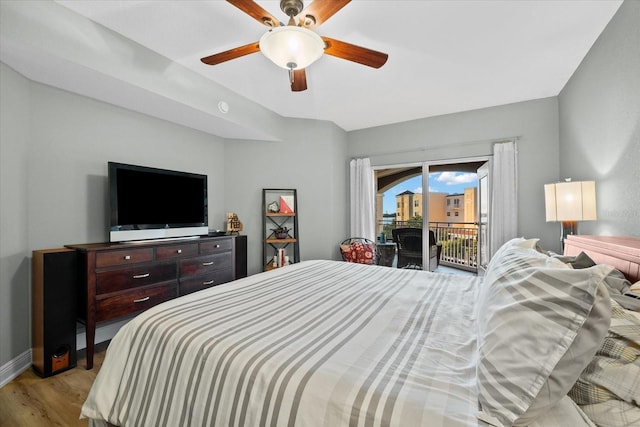 bedroom featuring access to outside, ceiling fan, and light hardwood / wood-style floors