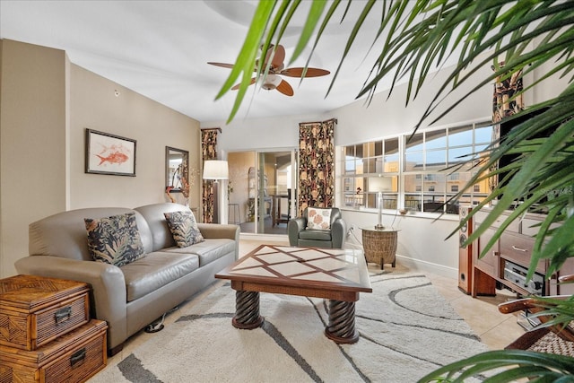 tiled living room with ceiling fan