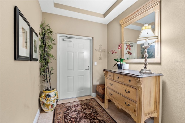 entryway featuring light tile patterned floors