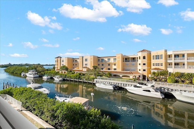 property view of water featuring a boat dock