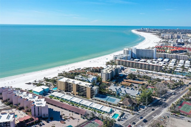 bird's eye view featuring a water view and a view of the beach