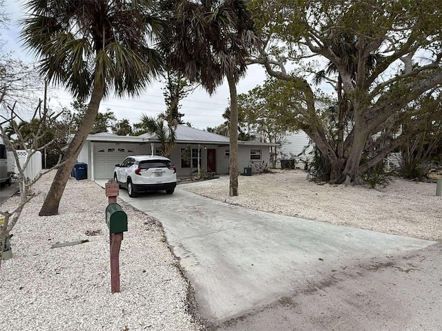 single story home with a garage