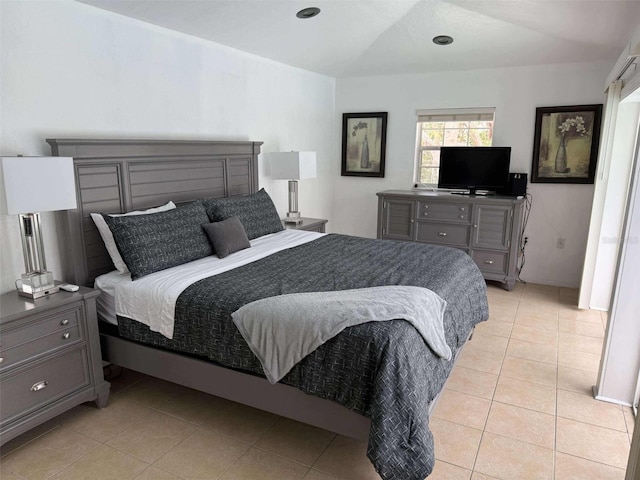 bedroom featuring light tile patterned floors