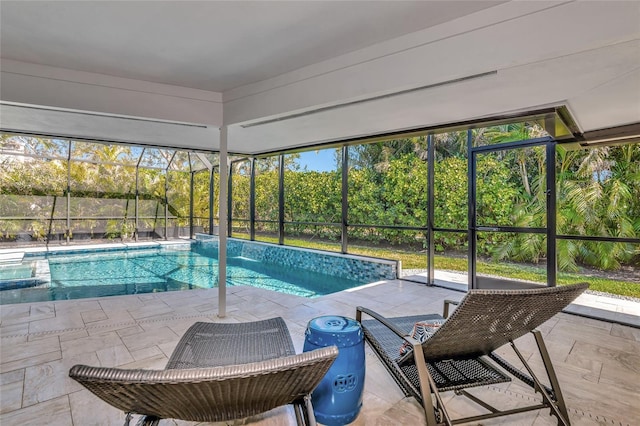 view of pool featuring a lanai and a patio area