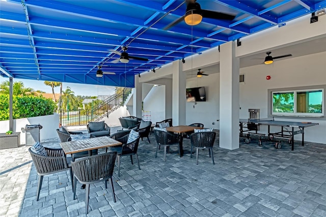 view of patio / terrace featuring ceiling fan