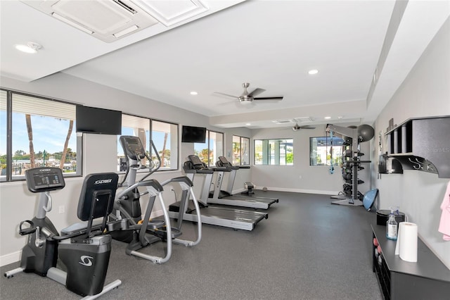 exercise room with ceiling fan