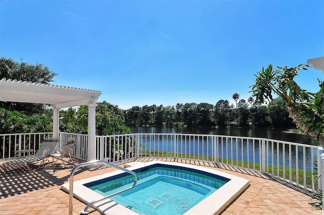 view of pool with a pergola, an in ground hot tub, a patio, and a water view