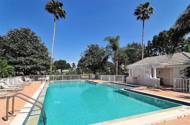 view of pool featuring a patio