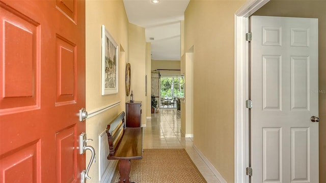 hallway with light tile patterned flooring