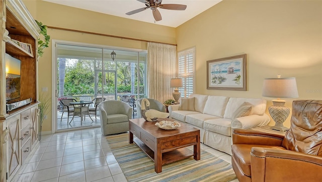 living room featuring light tile patterned floors and ceiling fan