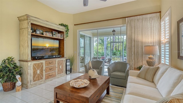 living room with light tile patterned floors and ceiling fan