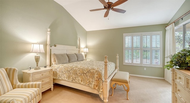 bedroom with vaulted ceiling, light carpet, and ceiling fan