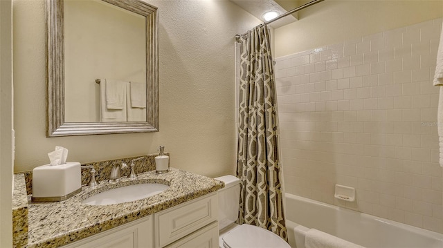 full bathroom featuring vanity, toilet, and shower / bath combo with shower curtain